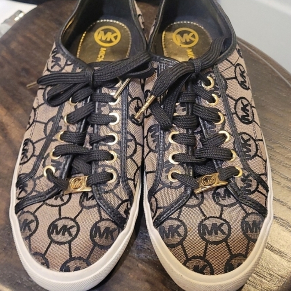 Pair of pre-loved MICHAEL Michael Kors sneakers.